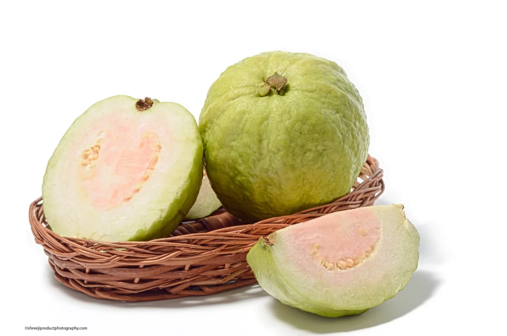 Guava - Peru in basket on white backround – product photography by Shreeji, Nagpur