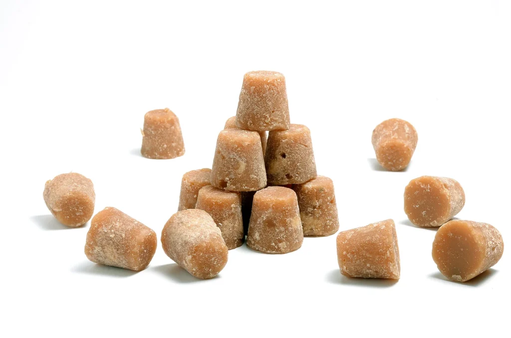 Jaggery cubes - Gur on white background - product photography by Shreeji, Nagpur